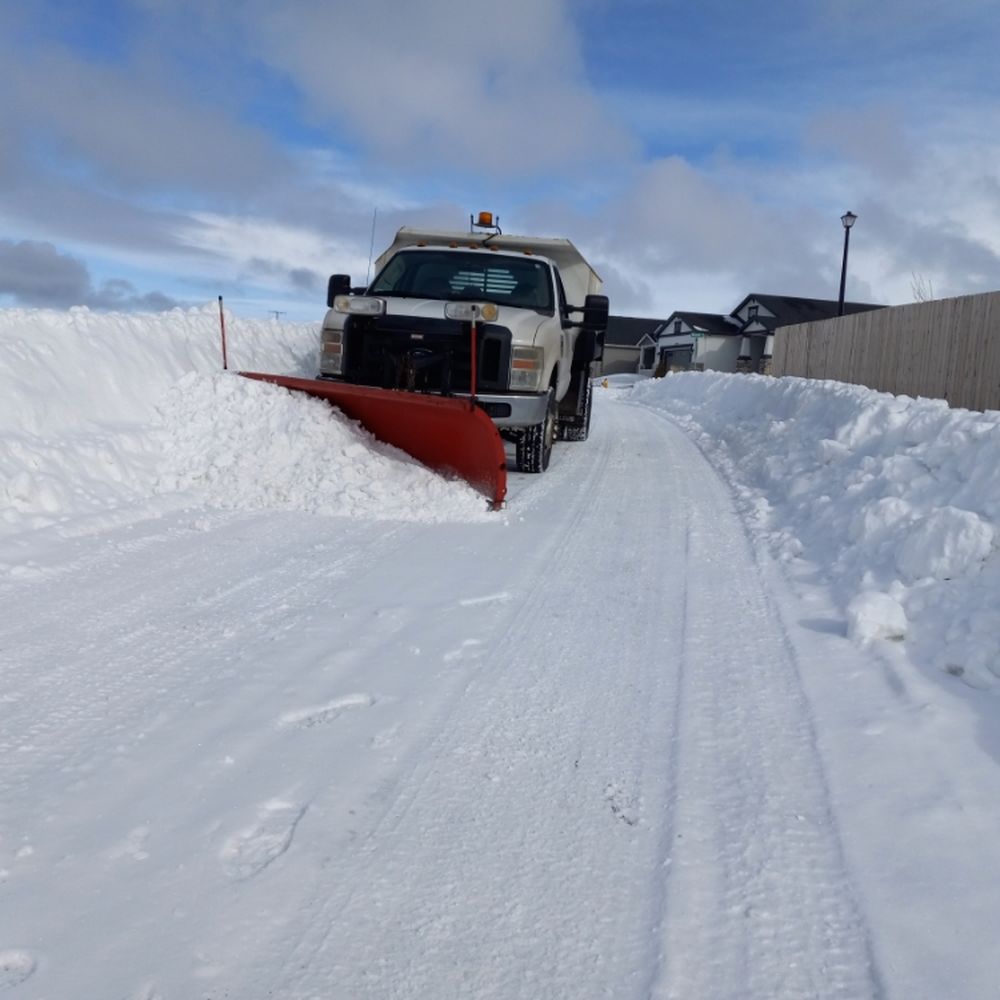 Residential driveway snow plowing in Edmonton